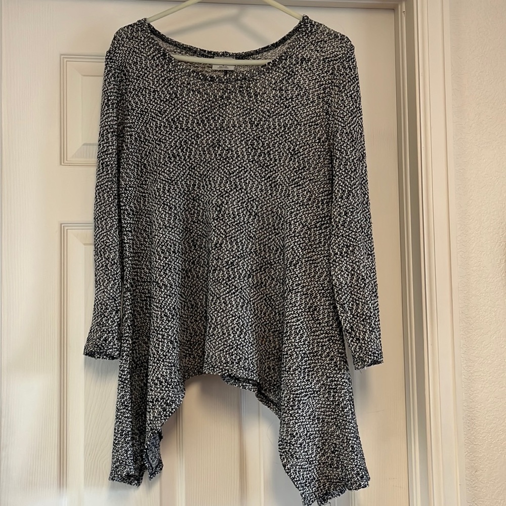 This black and white sweater is thin and goes great with just about anything.